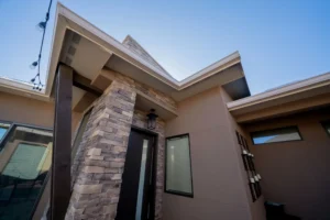 Modern house exterior with stone accents.
