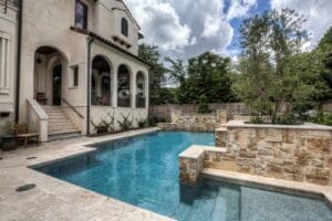 Spacious backyard with stone pool
