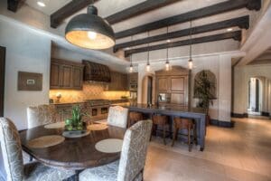 Open-concept kitchen featuring rustic decor elements