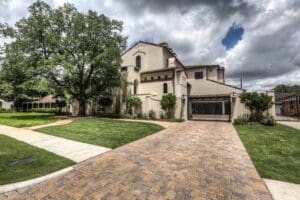 Large house with brick driveway