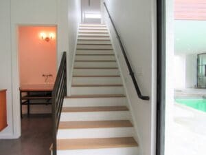 Stairway beside an open door