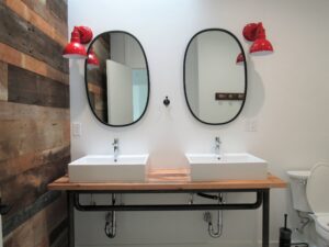 Modern bathroom with double sinks and mirrors