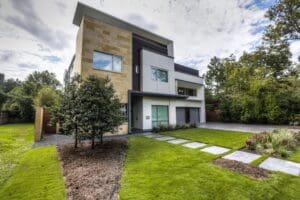 Modern house with lush green lawn
