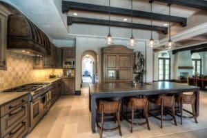 Spacious kitchen featuring pendant lighting