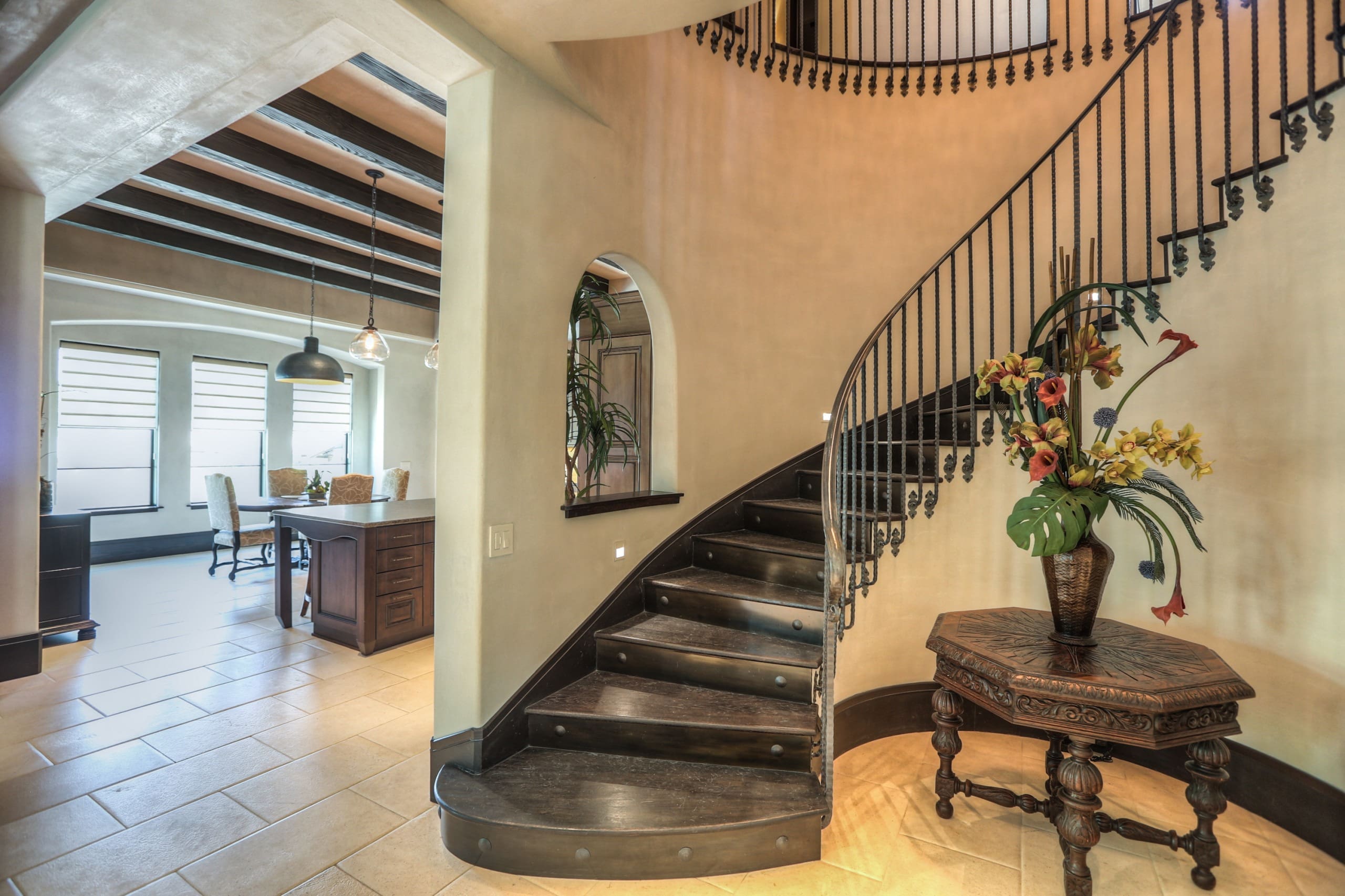 Curved staircase in elegant home interior.