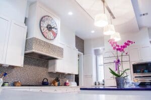 Bright kitchen with pink orchid centerpiece