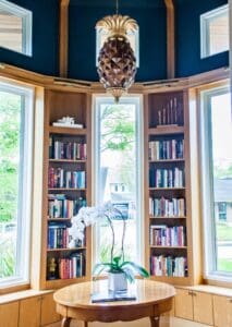 Cozy reading nook with large windows