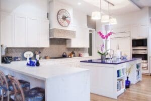 Spacious kitchen with pendant lights and decor
