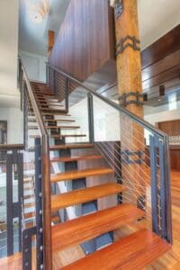 Stylish staircase featuring wood and metal