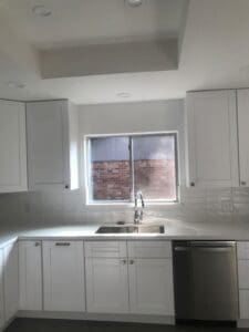 Bright kitchen featuring stainless steel appliances