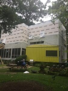 House under renovation with yellow extension