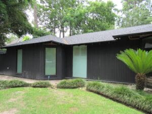 Modern black house with large windows